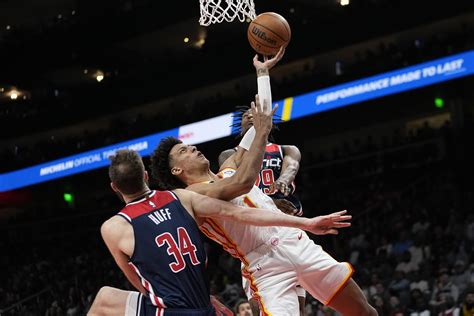 Young has 25 as Hawks gain momentum, beat Wizards 134-116
